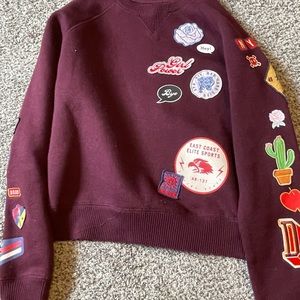 Burgundy Aeropostale crew neck embroidered patches